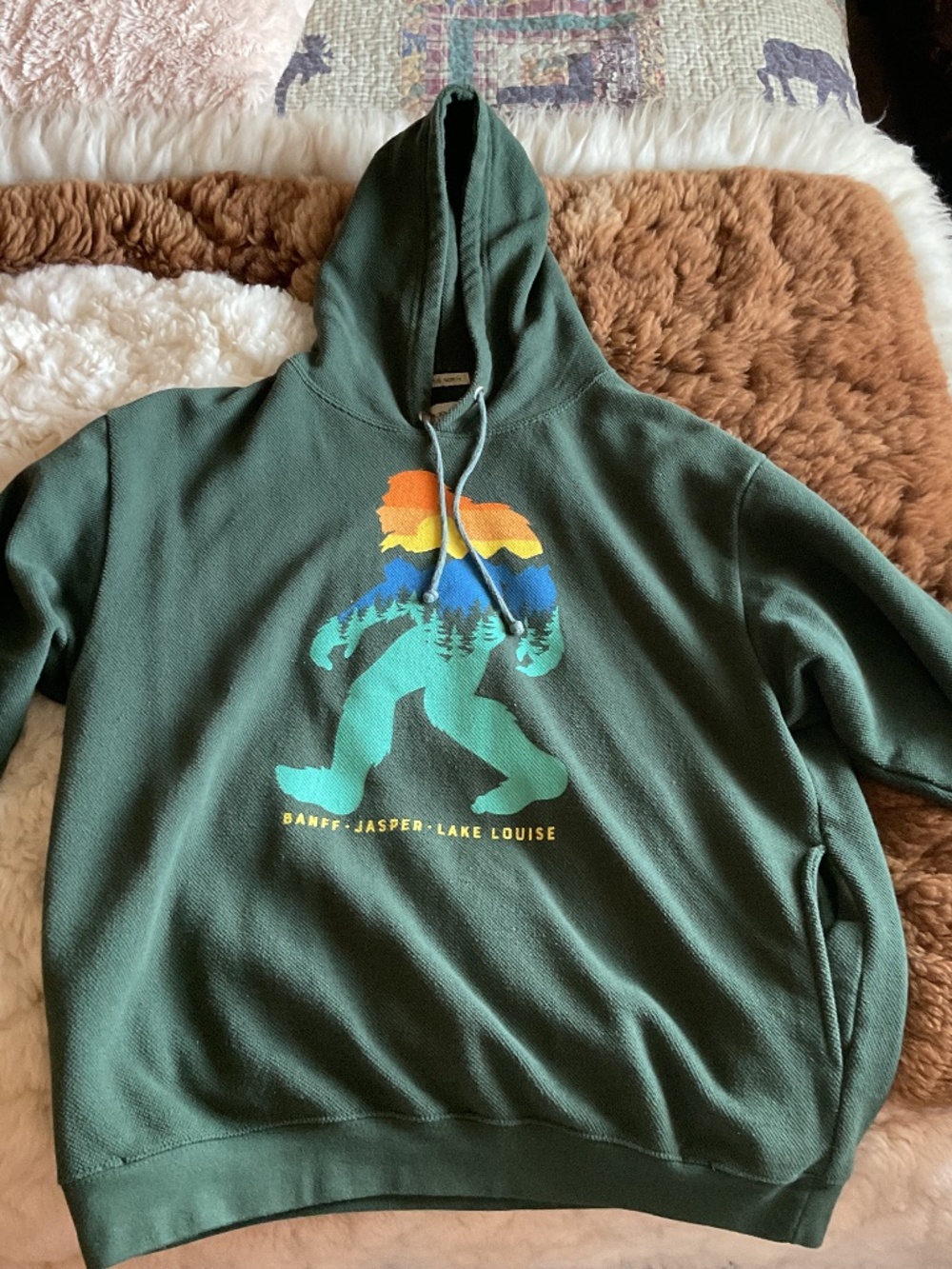 Dark green Saskwatch  sweatshirt